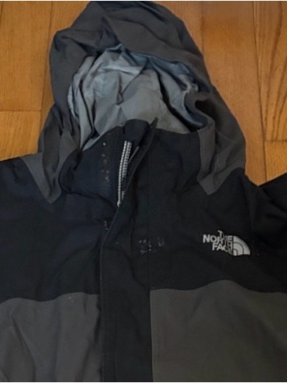 The North Face Boy's  Hooded Rain Jacket in Black and Gray
